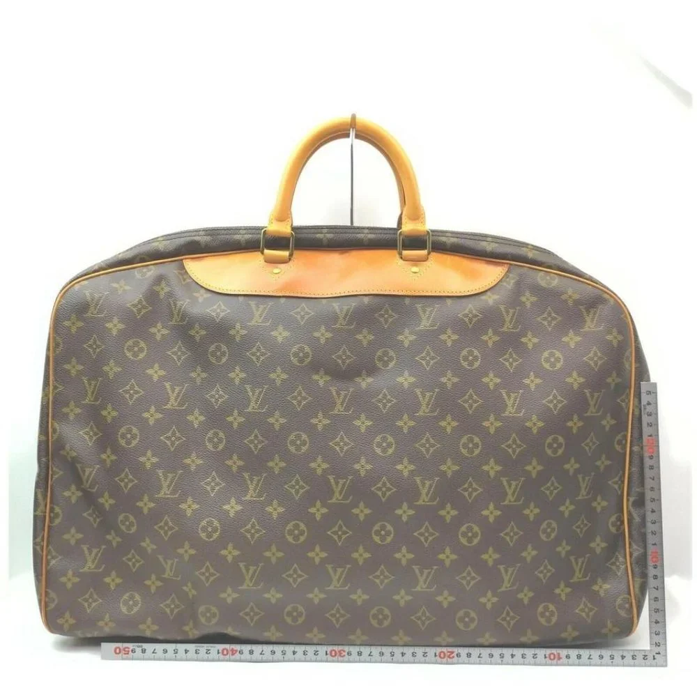 Louis Vuitton Monogram Alize 1 Poche Travel Bag